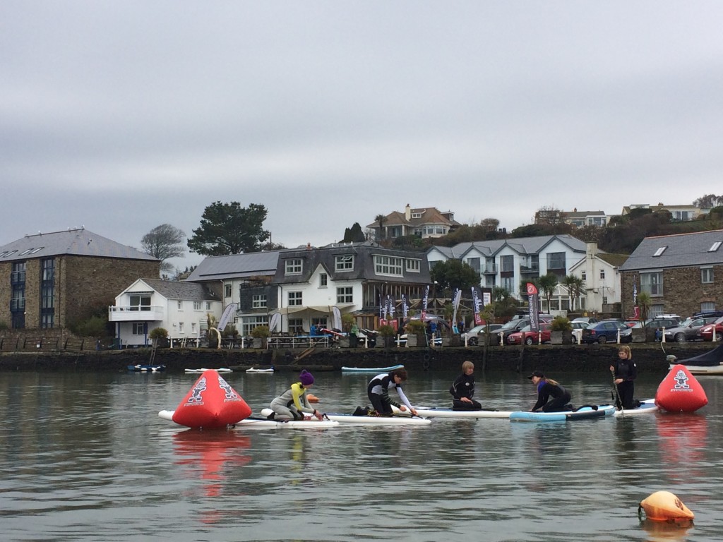 Lauren Hill, takes the first SUP Yoga session. 