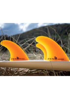 FCS II Performer Neo Glass Surfboard Fins in mango outside