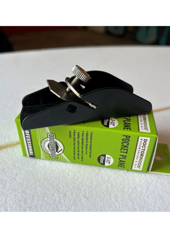 Pocket Plane for Surfboard Stringers product on top of box